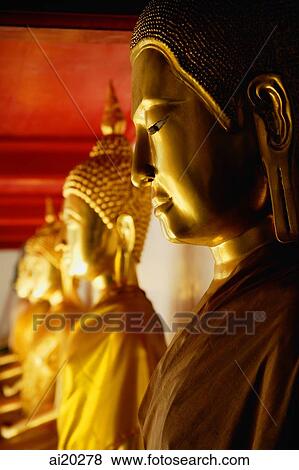 Row of Golden Buddha statues, Wat Pho, Bangkok, Thailand View Large Photo Image Stock Photo - Row of Golden Buddha statues, Wat Pho, Bangkok, Thailand. Fotosearch
