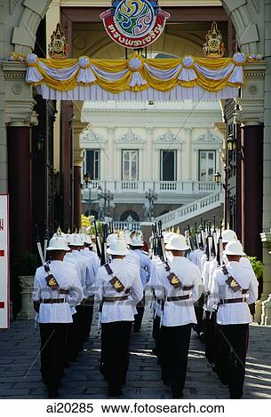 The Grand Palace, Wat Phra Kaeo, Marching Grand Palace Guards, Marching Royal Guards, Bangkok, Thailand View Large Photo Image Stock Photography - The Grand Palace, Wat Phra Kaeo, Marching Grand Palace Guards, Marching Royal Guards, Bangkok, Thailand. Fotosearch