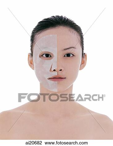 Young woman looking at camera, wearing half a face mask View Large Photo Image Stock Image - Young woman looking at camera, wearing half a face mask. Fotosearch