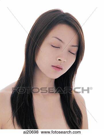 Young woman with long straight hair, eyes closed View Large Photo Image Stock Photo - Young woman with long straight hair, eyes closed. Fotosearch