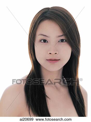 Young woman with long straight hair looking at camera, portrait View Large Photo Image Stock Photo - Young woman with long straight hair looking at camera, portrait. Fotosearch