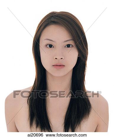 Young woman with long straight hair looking at camera View Large Photo Image Stock Photograph - Young woman with long straight hair looking at camera. Fotosearch