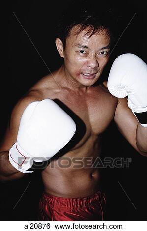 Male boxer with boxing gloves View Large Photo Image Stock Photograph - Male boxer with boxing gloves. Fotosearch