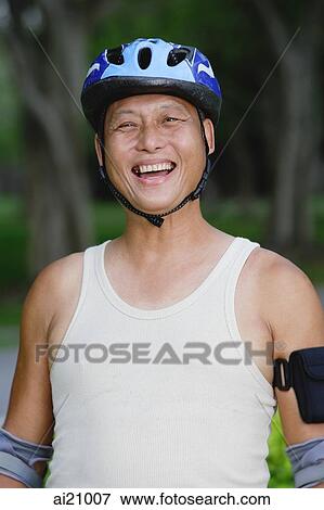 Mature adult wearing sports helmet View Large Photo Image Stock Photo - Mature adult wearing sports helmet. Fotosearch