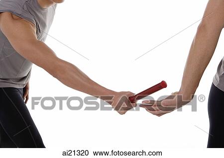 Close-up of two men handing over relay baton View Large Photo Image Stock Image - Close-up of two men handing over relay baton. Fotosearch