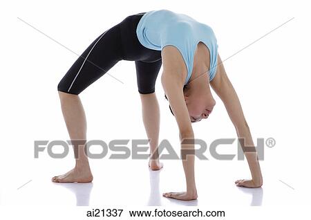 Female gymnast doing the Bridge position View Large Photo Image Stock Photo - Female gymnast doing the Bridge position. Fotosearch