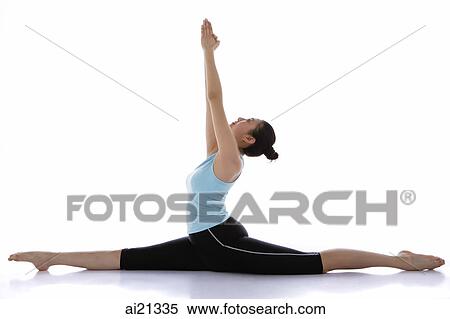 Female gymnast performing gymnastics in studio View Large Photo Image Stock Photography - Female gymnast performing gymnastics in studio. Fotosearch