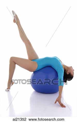 Gymnast balancing on fitness ball View Large Photo Image Stock Image - Gymnast balancing on fitness ball. Fotosearch