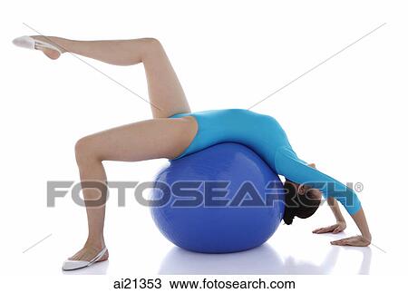 Gymnast balancing on fitness ball View Large Photo Image Stock Image - Gymnast balancing on fitness ball. Fotosearch