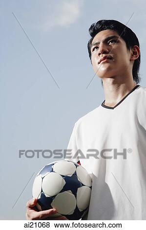 Soccer player with soccer ball, portrait View Large Photo Image Stock Photo - Soccer player with soccer ball, portrait. Fotosearch