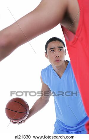 Two men playing basketball View Large Photo Image Stock Image - Two men playing basketball. Fotosearch