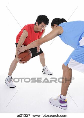 Two men playing basketball View Large Photo Image Stock Photo - Two men playing basketball. Fotosearch