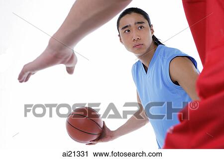 Two men playing basketball, studio shot View Large Photo Image Stock Image - Two men playing basketball, studio shot. Fotosearch