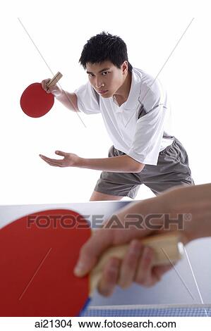 Two men playing table tennis View Large Photo Image Picture - Two men playing table tennis. Fotosearch