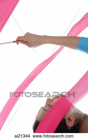 Woman performing rhythmic gymnastics View Large Photo Image Picture - Woman performing rhythmic gymnastics. Fotosearch