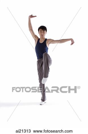 Young man practicing Kong fu View Large Photo Image Stock Image - Young man practicing Kong fu. Fotosearch