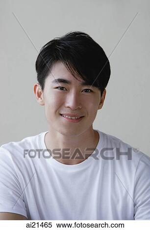 Young man, smiling at camera View Large Photo Image Stock Photography - Young man, smiling at camera. Fotosearch