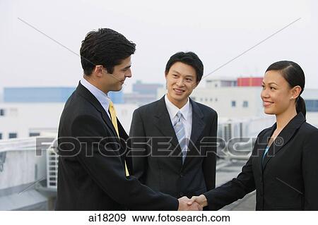 Businessman and businesswoman shaking hands View Large Photo Image Stock Photo - Businessman and businesswoman shaking hands. Fotosearch