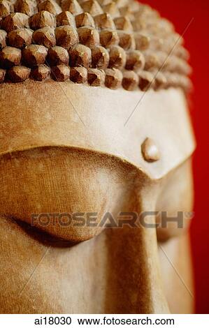 Stock Image - Close-up of Buddha Sculpture Head. Fotosearch