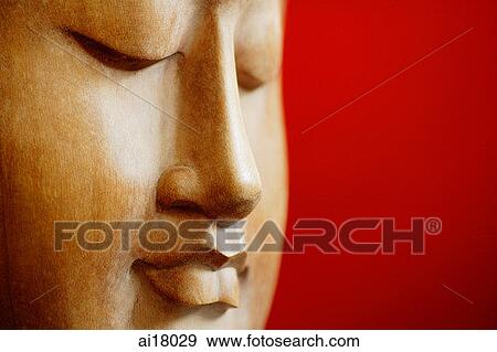 Stock Photo - Close-up of Buddha Sculpture Head. Fotosearch