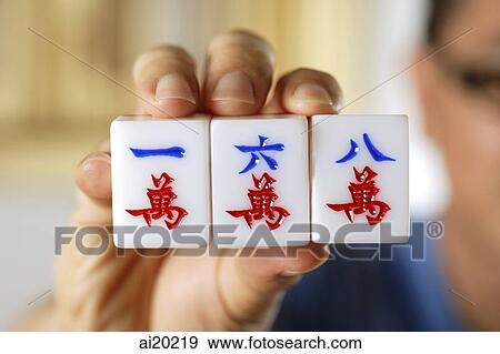 Close-up of mahjong tiles with Chinese characters for One, Six and Eight View Large Photo Image Stock Photo - Close-up of mahjong tiles with Chinese characters for One, Six and Eight. Fotosearch