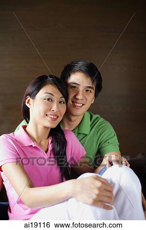 Couple looking at camera View Large Photo Image Stock Photograph - Couple looking at camera. Fotosearch
