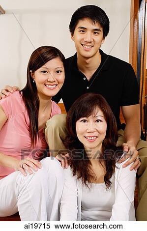 Couple sitting on stairs with mature woman View Large Photo Image Stock Photography - Couple sitting on stairs with mature woman. Fotosearch