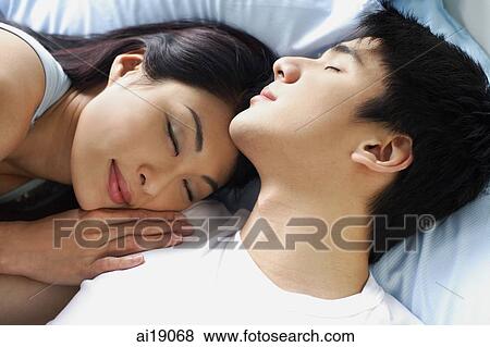 Couple sleeping, head shot View Large Photo Image Stock Photo - Couple sleeping, head shot. Fotosearch