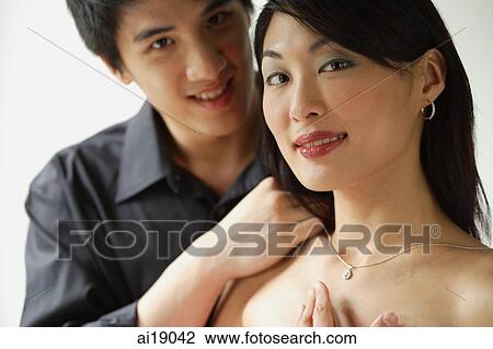 Couple smiling at camera, head shot View Large Photo Image Stock Image - Couple smiling at camera, head shot. Fotosearch