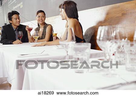 Couples dining in restaurant View Large Photo Image Stock Photo - Couples dining in restaurant. Fotosearch