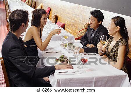 Couples dining in restaurant View Large Photo Image Stock Photography - Couples dining in restaurant. Fotosearch