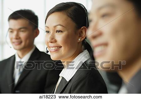 Customer service officers, in a row View Large Photo Image Stock Image - Customer service officers, in a row. Fotosearch