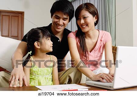 Family with one daughter, at home View Large Photo Image Picture - Family with one daughter, at home. Fotosearch