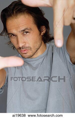 Man looking at camera View Large Photo Image Stock Photo - Man looking at camera. Fotosearch