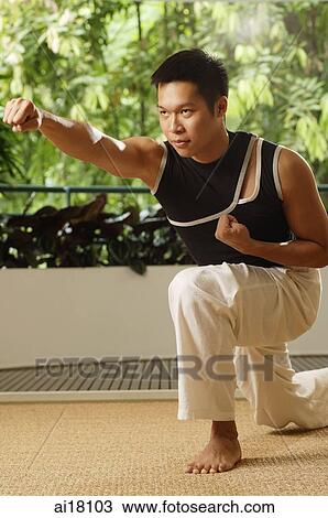 Man practicing karate View Large Photo Image Stock Image - Man practicing karate. Fotosearch