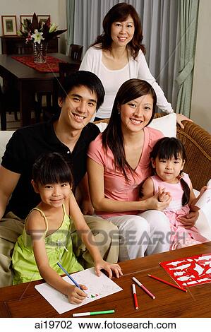 Three generation family looking at camera, portrait View Large Photo Image Stock Image - Three generation family looking at camera, portrait. Fotosearch