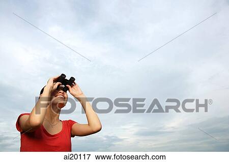 Woman with binoculars View Large Photo Image Stock Photo - Woman with binoculars. Fotosearch
