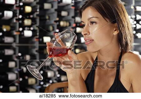 Young woman drinking from wine glass View Large Photo Image Stock Photography - Young woman drinking from wine glass. Fotosearch