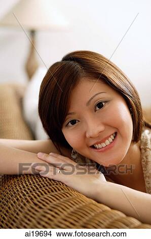 Young woman looking at camera View Large Photo Image Picture - Young woman looking at camera. Fotosearch