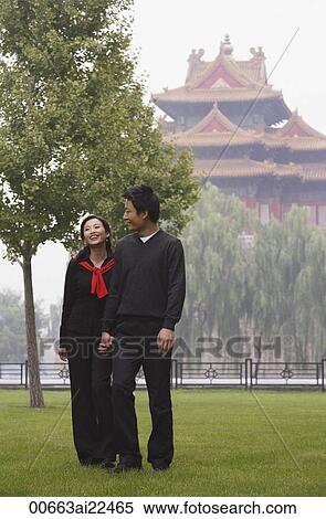 A couple walk in front of The Forbidden City, Beijing View Large Photo Image Stock Photography - A couple walk in front of The Forbidden City, Beijing. Fotosearch