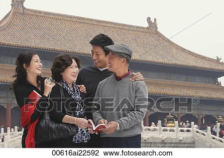 A family pose for photos together in front of The Forbidden City, Beijing View Large Photo Image Stock Image - A family pose for photos together in front of The Forbidden City, Beijing. Fotosearch