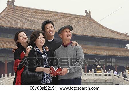 A family pose for photos together in front of The Forbidden City, Beijing View Large Photo Image Stock Image - A family pose for photos together in front of The Forbidden City, Beijing. Fotosearch