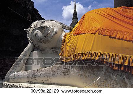 A reclining Buddha at Wat Yai Chai Mongkhon, Ayutthara, Thailand View Large Photo Image Stock Photo - A reclining Buddha at Wat Yai Chai Mongkhon, Ayutthara, Thailand. Fotosearch