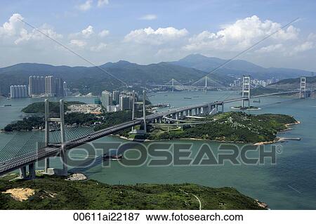 Stock Photo - Aerial view overlooking Tsing Ma Bridge and Park Island, Hong Kong. Fotosearch