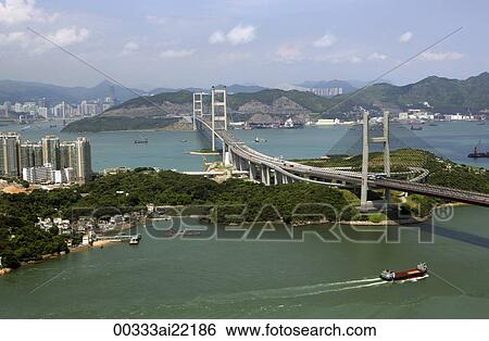 Stock Photograph - Aerial view overlooking Tsing Ma Bridge and Park Island, Hong Kong. Fotosearch