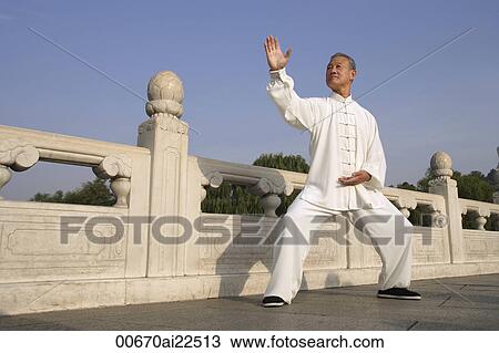 An old man practices Chinese martial arts View Large Photo Image Stock Image - An old man practices Chinese martial arts. Fotosearch