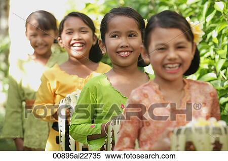 Stock Photography - Balinese children laughing. Fotosearch