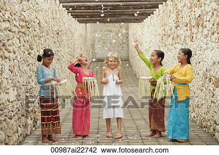 Balinese girls and European girl View Large Photo Image Stock Image - Balinese girls and European girl. Fotosearch