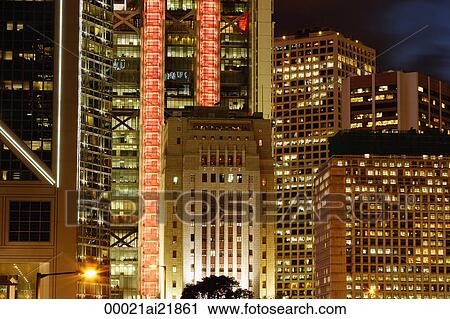 Stock Image - Buildings in Hong Kong at night. Fotosearch