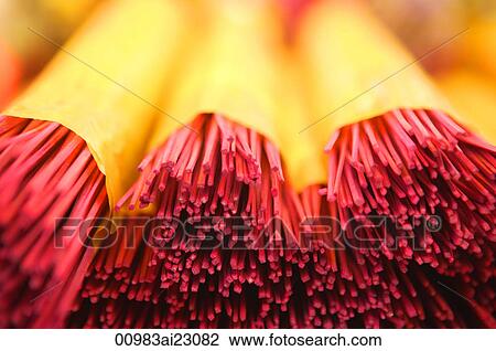 Stock Image - Bundles of incense sticks. Fotosearch